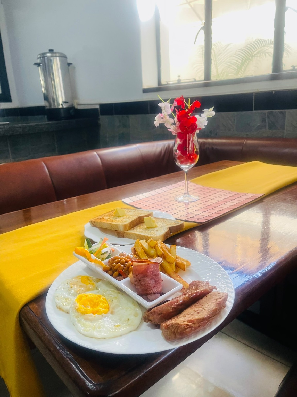 Breakfast spread with fruit and hot food at The Standard Hotel
